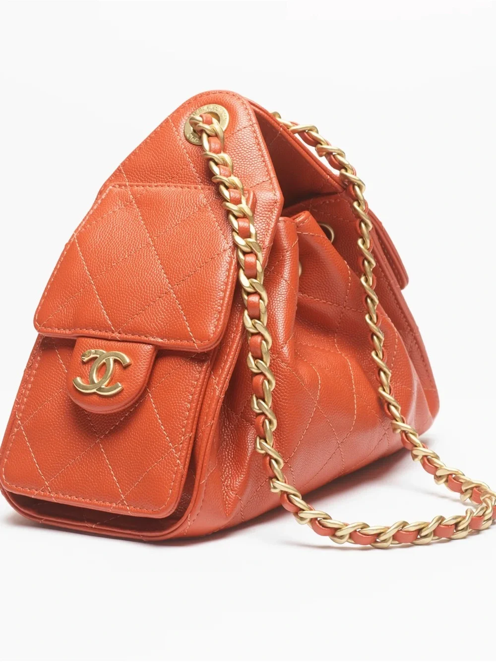 CHANEL Orange Quilted Drawstring Shoulder Bag with Gold Chain